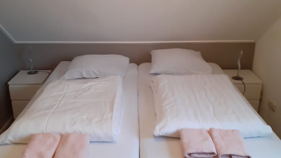 Koffer rein und wohlfühlen 1 bezogene Betten mit Handtuchpaket - Schakelvilla Ferienhaus mit Sauna am IJsselmeer