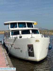 Woudsend 43 Aquastar - Woudsend - Schakelvilla - Ferienhaus mit Sauna Kamin und Ruderboot am IJsselmeer in Makkum